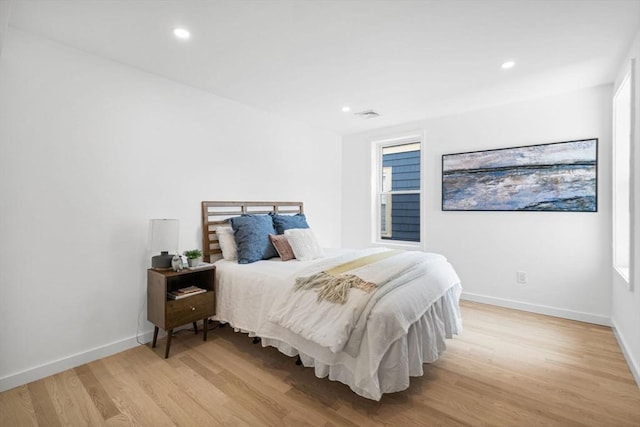 bedroom featuring light hardwood / wood-style flooring