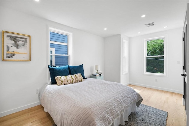 bedroom with light wood-type flooring