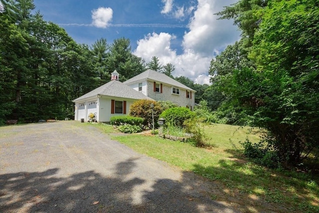 217 Grove St, Paxton, MA 01612 - view of front of home with an attached garage and driveway