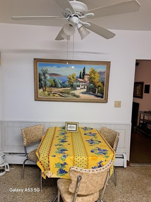 217 Grove St, Paxton, MA 01612 - dining space with wainscoting, ceiling fan, and a baseboard radiator