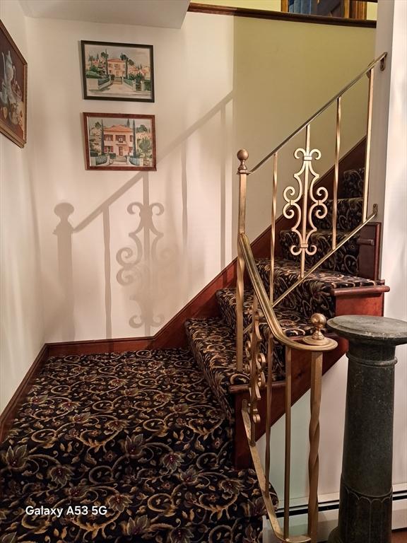 217 Grove St, Paxton, MA 01612 - stairway featuring baseboards