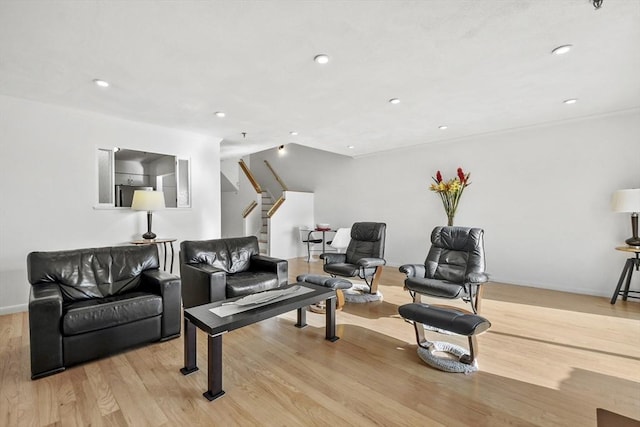 living room with light hardwood / wood-style flooring