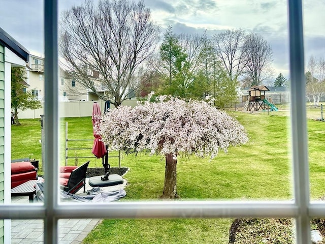 view of property's community with a playground