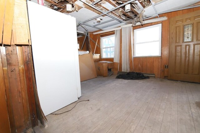 miscellaneous room with hardwood / wood-style flooring and a baseboard radiator