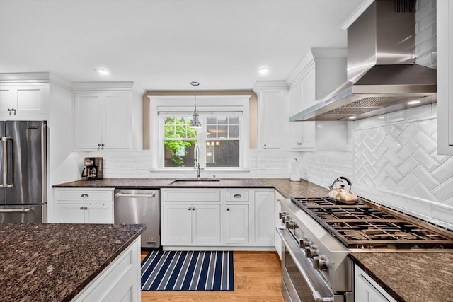 26 Downing Rd, Lexington, MA 02421 - kitchen with appliances with stainless steel finishes, a sink, wall chimney range hood, white cabinetry, and recessed lighting