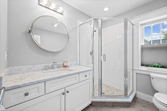 26 Downing Rd, Lexington, MA 02421 - full bathroom with toilet, a stall shower, vanity, baseboards, and recessed lighting