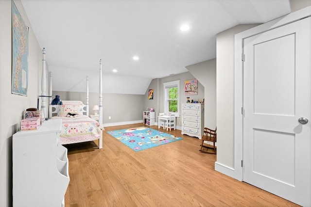 26 Downing Rd, Lexington, MA 02421 - bedroom with light wood-type flooring, vaulted ceiling, baseboards, and recessed lighting