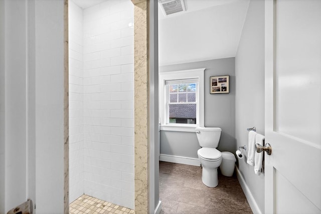 26 Downing Rd, Lexington, MA 02421 - full bathroom featuring tiled shower, toilet, baseboards, and tile patterned flooring