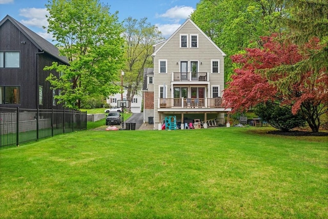 26 Downing Rd, Lexington, MA 02421 - rear view of property featuring a balcony