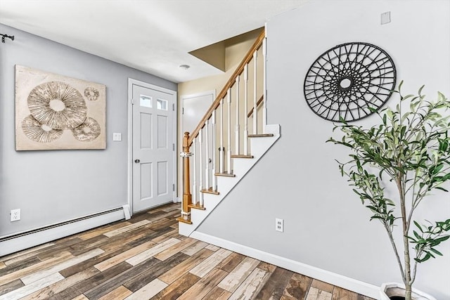 foyer featuring a baseboard radiator and dark hardwood / wood-style flooring