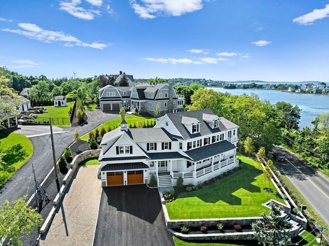 drone / aerial view featuring a water view