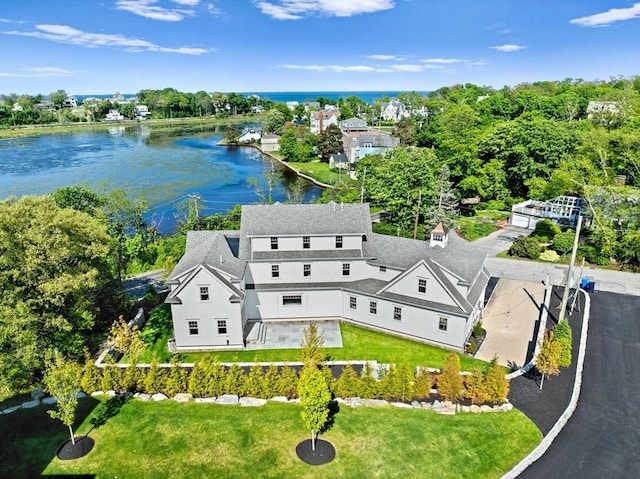 bird's eye view with a water view