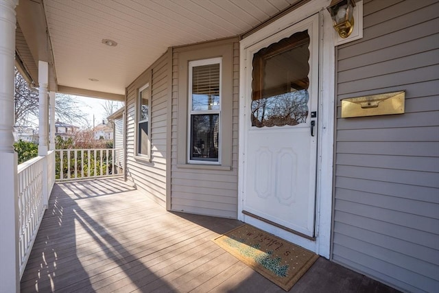 doorway to property featuring a porch