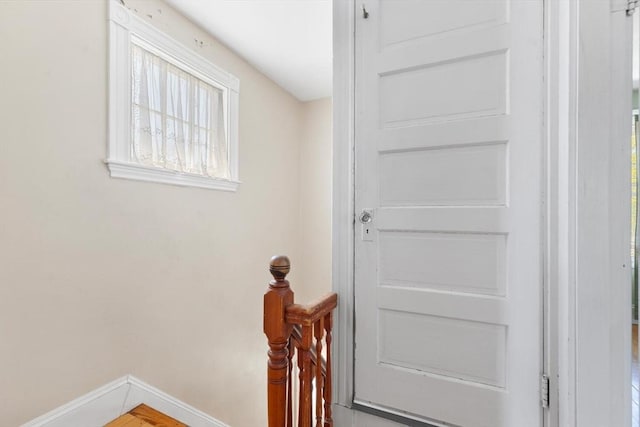 stairway with baseboards