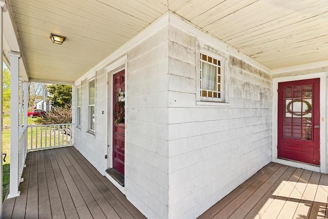 doorway to property with a porch