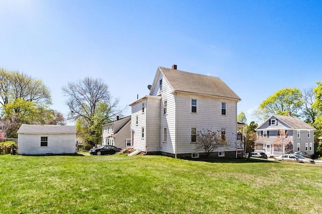 view of home's exterior featuring a lawn