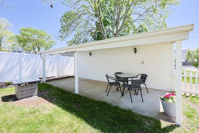 view of patio / terrace featuring fence