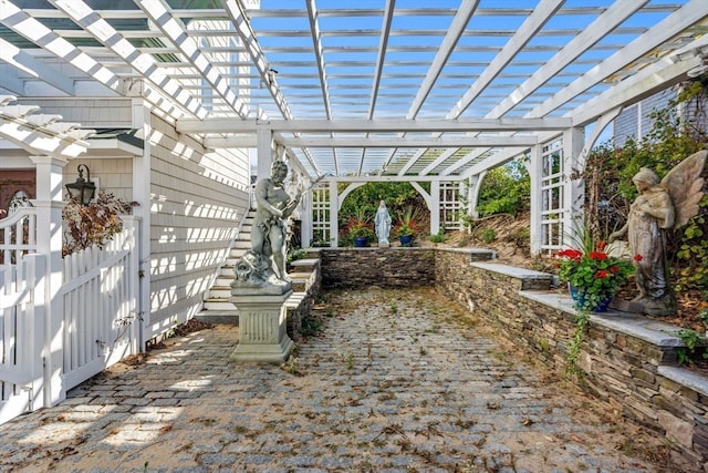 view of patio featuring a pergola