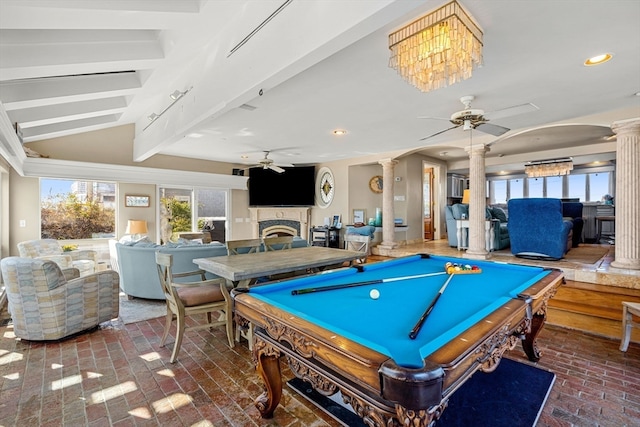 game room featuring pool table, ceiling fan, lofted ceiling with beams, and decorative columns