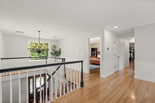 4 Country Way, Hopkinton, MA 01748 - corridor with a chandelier, light wood-type flooring, recessed lighting, and an upstairs landing