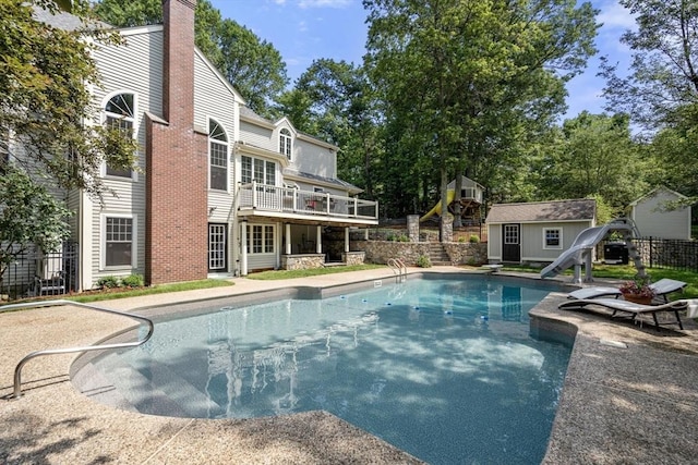 4 Country Way, Hopkinton, MA 01748 - view of pool featuring a shed, a water slide, and a patio