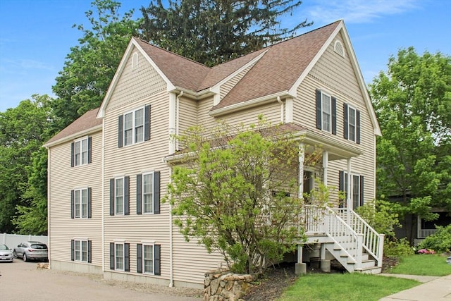 239 Union St, Franklin, MA 02038 - view of home's exterior with a shingled roof