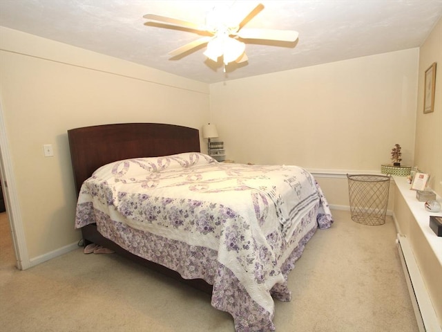 239 Union St, Franklin, MA 02038 - carpeted bedroom with baseboard heating, a ceiling fan, and baseboards