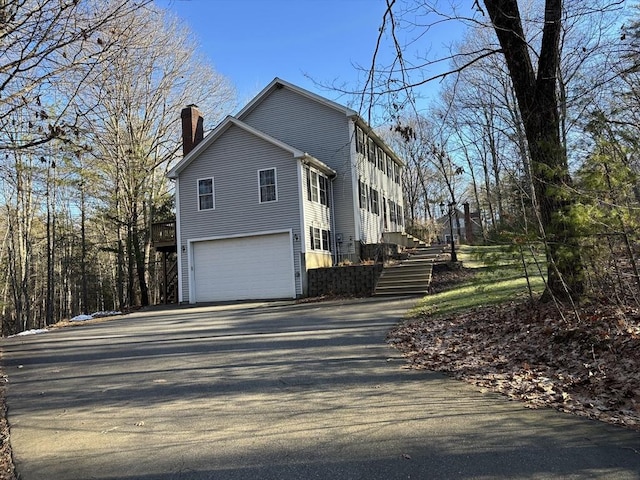 view of home's exterior featuring a garage