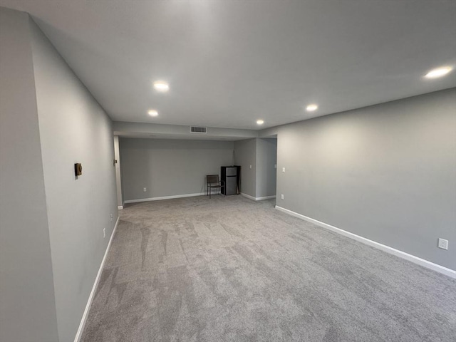 basement with carpet flooring