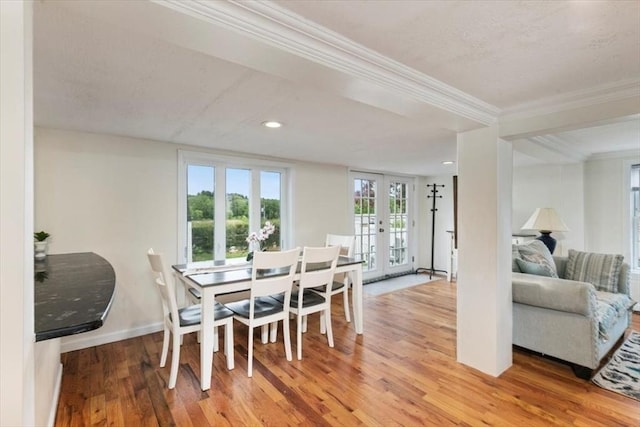 701 Nashua Rd, Dracut, MA 01826 - dining space featuring light wood-style floors, french doors, ornamental molding, baseboards, and recessed lighting