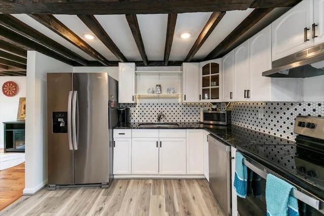 701 Nashua Rd, Dracut, MA 01826 - kitchen featuring appliances with stainless steel finishes, under cabinet range hood, a sink, tasteful backsplash, and open shelves