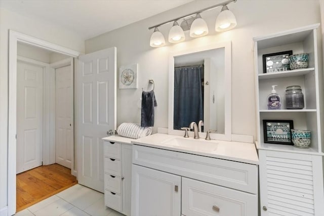 701 Nashua Rd, Dracut, MA 01826 - full bathroom with vanity and tile patterned floors