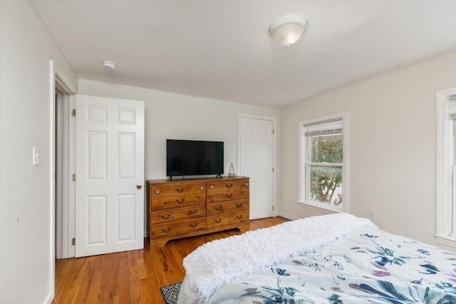701 Nashua Rd, Dracut, MA 01826 - bedroom with wood finished floors and baseboards