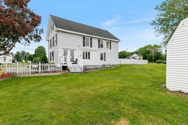 701 Nashua Rd, Dracut, MA 01826 - rear view of property featuring roof with shingles