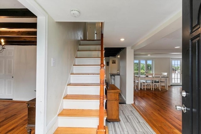 701 Nashua Rd, Dracut, MA 01826 - stairs with wood finished floors, recessed lighting, and baseboards