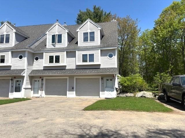 66 Schooner Lndg Unit 66, Hampton, NH 03842 - townhome / multi-family property with asphalt driveway, an attached garage, and roof with shingles