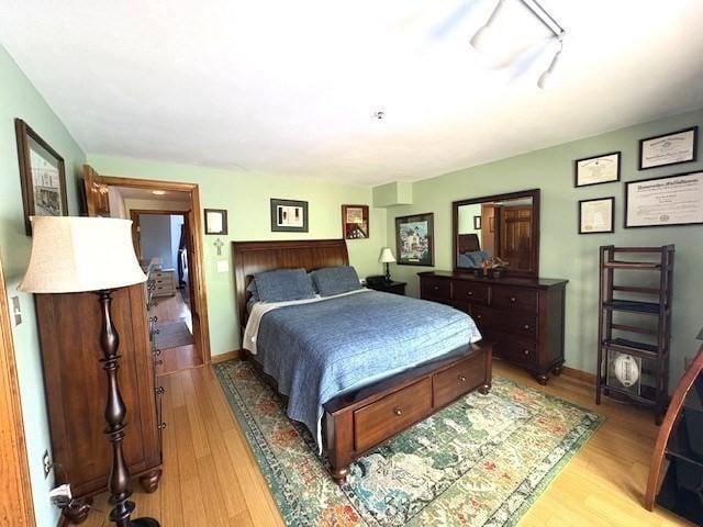 66 Schooner Lndg Unit 66, Hampton, NH 03842 - bedroom with light wood-style floors and baseboards