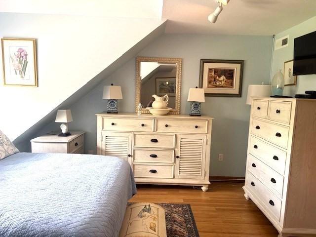 66 Schooner Lndg Unit 66, Hampton, NH 03842 - bedroom featuring wood finished floors