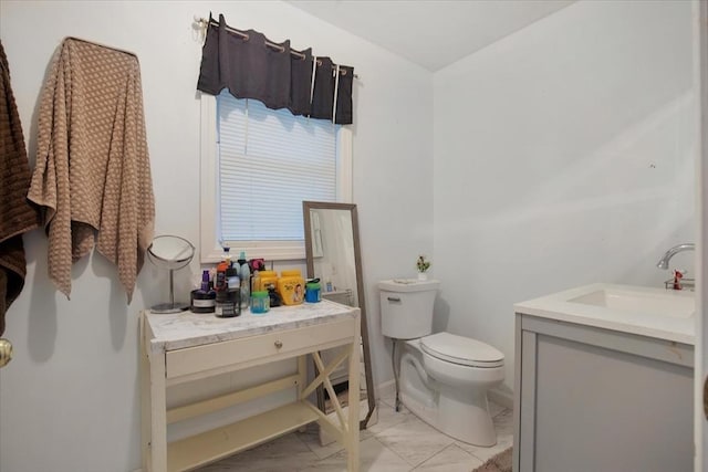 452 Nathan Ellis Hwy, Mashpee, MA 02649 - bathroom featuring marble look tiles and vanity