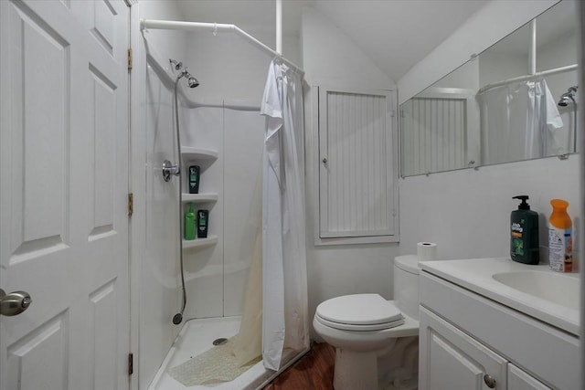452 Nathan Ellis Hwy, Mashpee, MA 02649 - bathroom with vanity, a shower stall, wood finished floors, and lofted ceiling