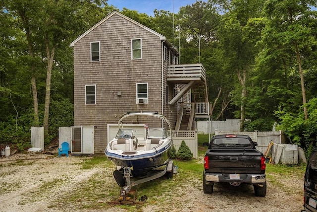 452 Nathan Ellis Hwy, Mashpee, MA 02649 - rear view of house featuring stairs and driveway