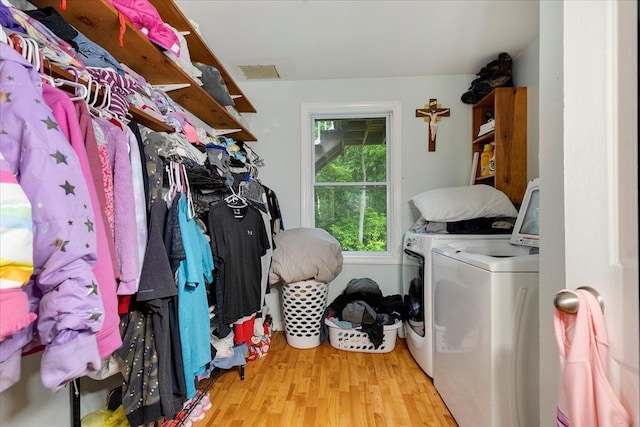 452 Nathan Ellis Hwy, Mashpee, MA 02649 - laundry area featuring washer and clothes dryer and wood finished floors