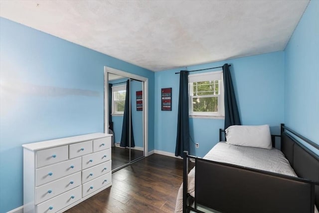 30 Shawnee, Pepperell, MA 01463 - bedroom with multiple windows and dark wood finished floors