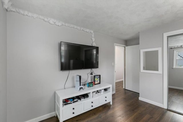 30 Shawnee, Pepperell, MA 01463 - living area with dark wood finished floors and a textured ceiling