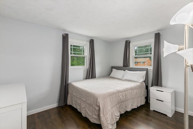 30 Shawnee, Pepperell, MA 01463 - bedroom featuring dark wood-type flooring and baseboards
