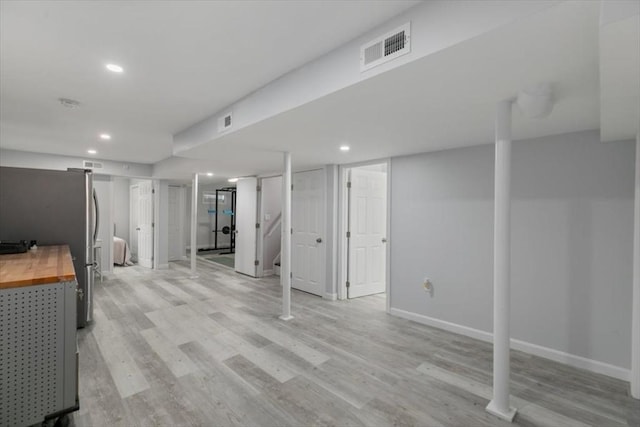 30 Shawnee, Pepperell, MA 01463 - finished below grade area featuring recessed lighting and light wood-style flooring