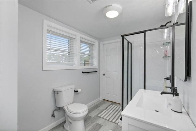 30 Shawnee, Pepperell, MA 01463 - bathroom with vanity, a stall shower, and wood finished floors