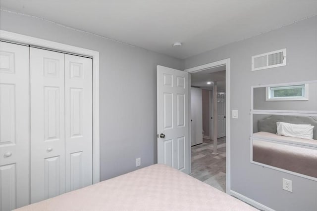 30 Shawnee, Pepperell, MA 01463 - bedroom featuring light wood-style floors and a closet