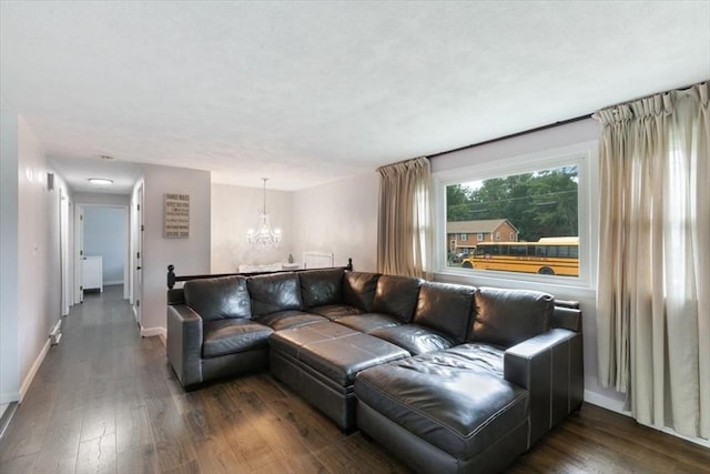 30 Shawnee, Pepperell, MA 01463 - living room featuring a chandelier and wood finished floors