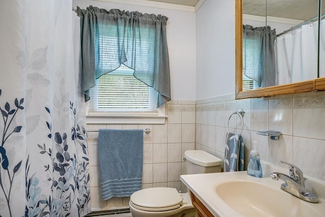bathroom featuring toilet, a shower with curtain, tile walls, and vanity
